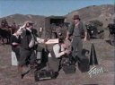 They stop to shoot the final scene of the western.
